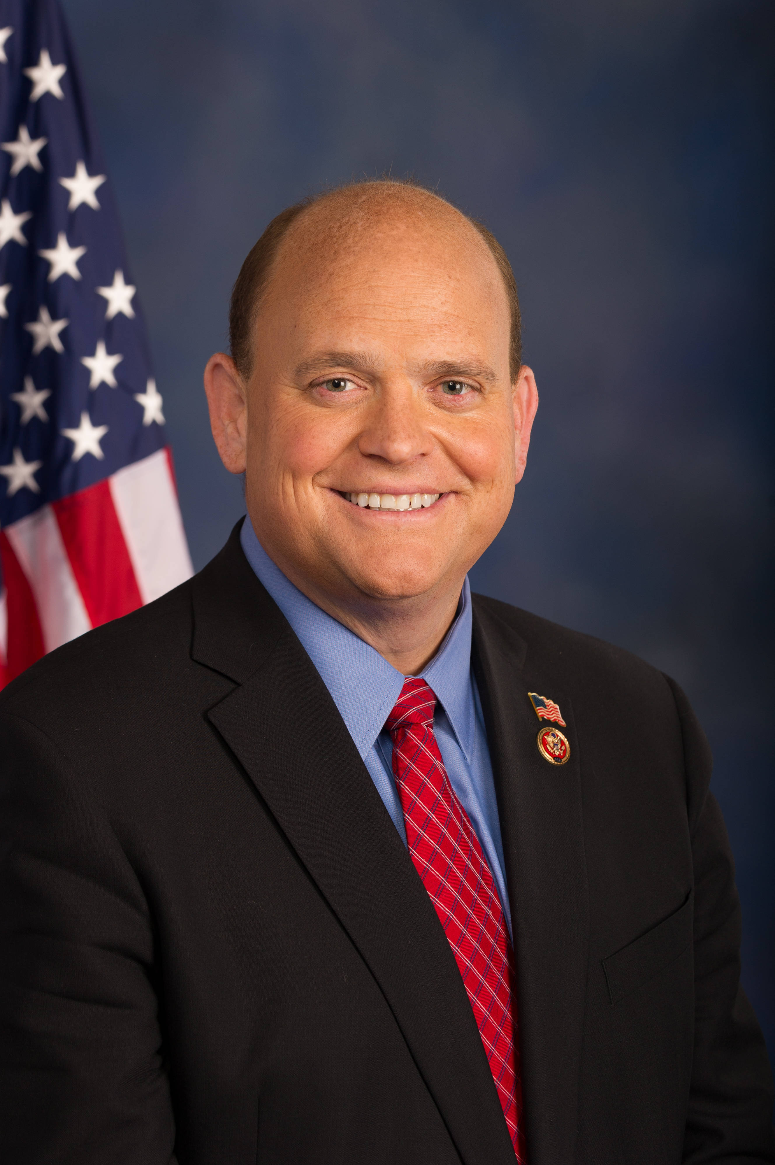 9b4b9556d1047742ea6d_222ac486b236eb4edecc_TomReedFlag.jpg