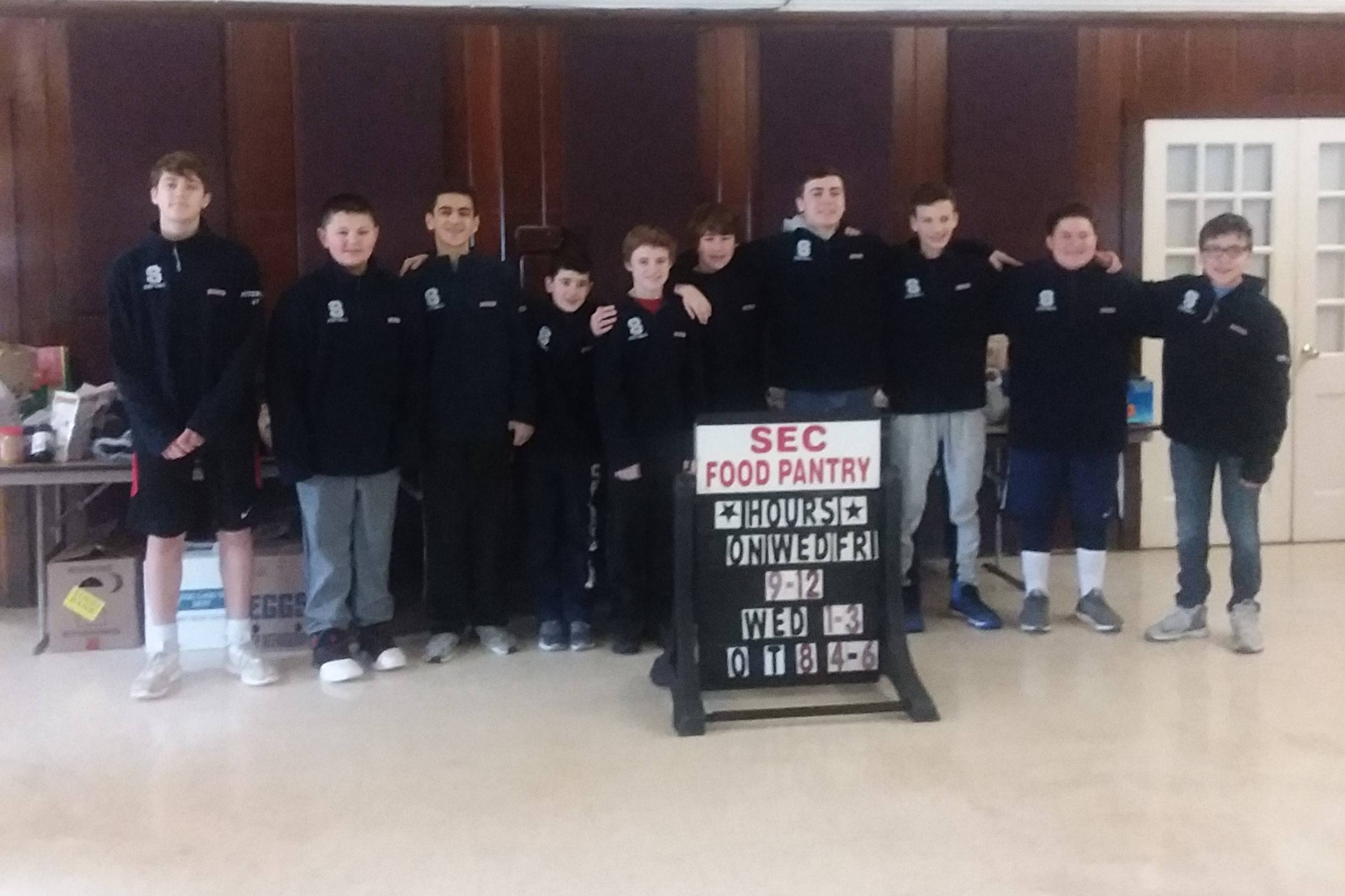 a1fbb57bd82820f7766b_Food_pantry_donations_7th_grade_2.10.18_cropped.jpg