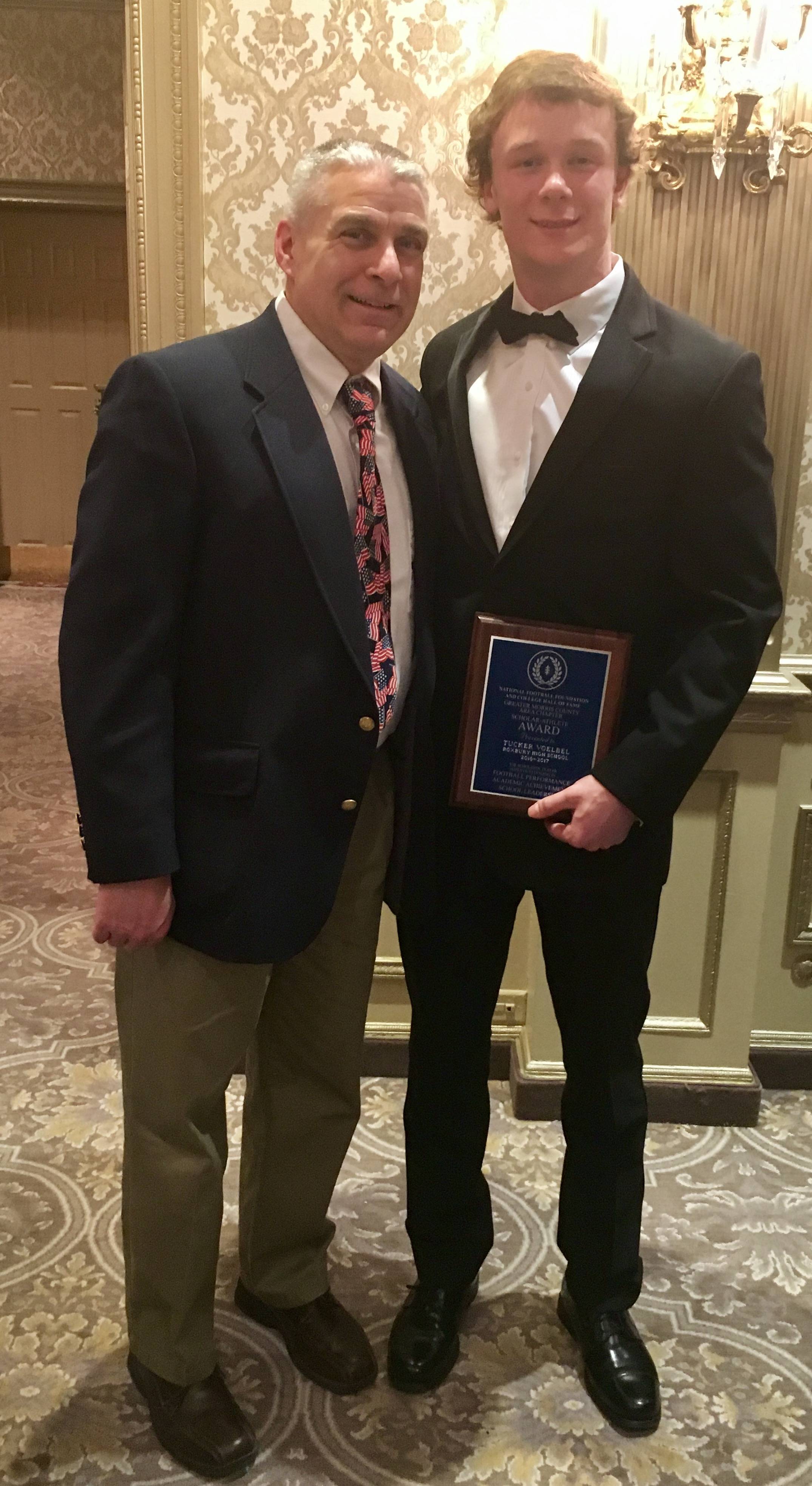 a695aacb9ee18ea5ff75_69050c25cf6e90e36ed4_Coach_Cosmo_Lorusso_and_Tucker_Voelbel.jpg