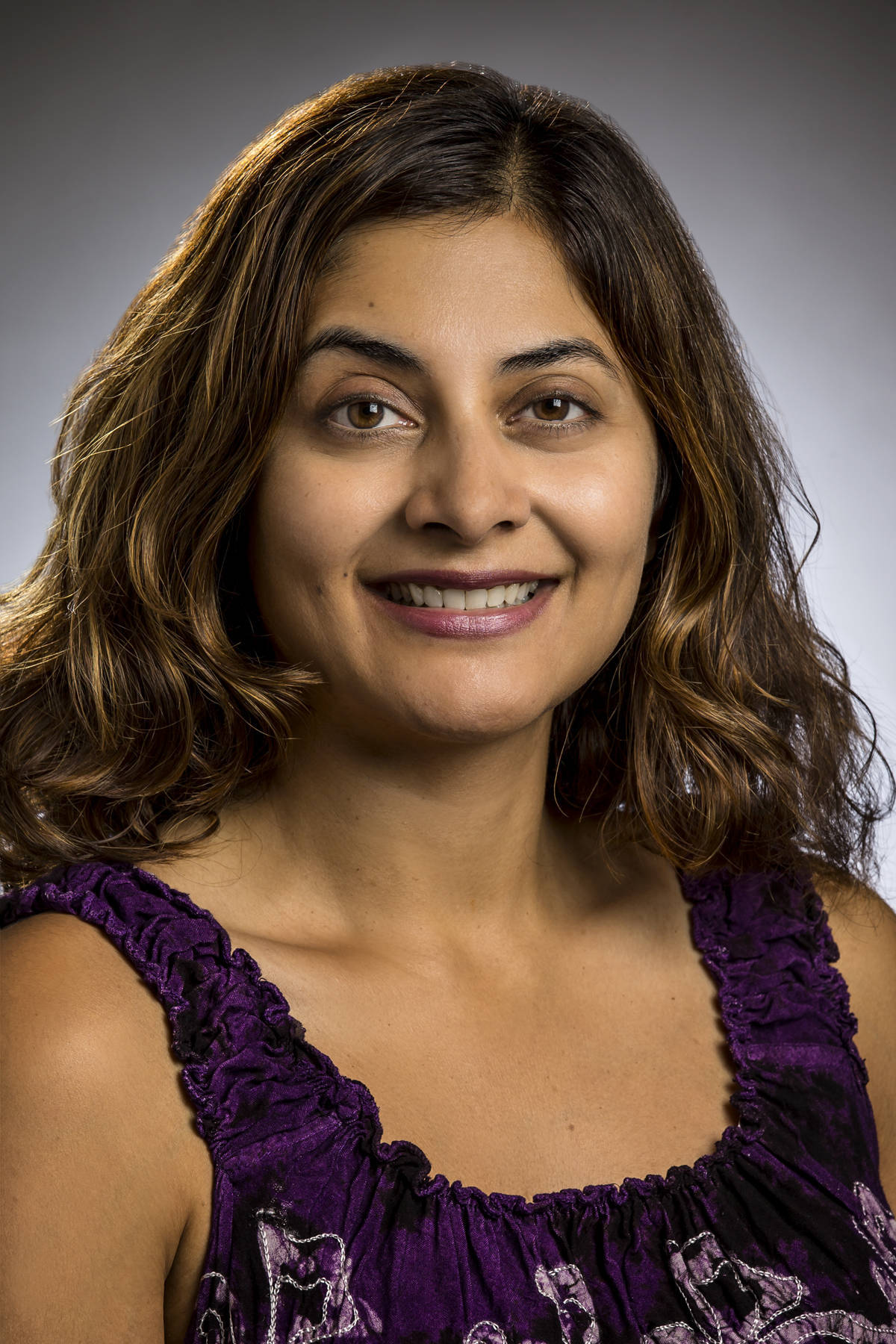 b49404b85fb1906bec12_Dr._Mona_Karim_2017.jpg
