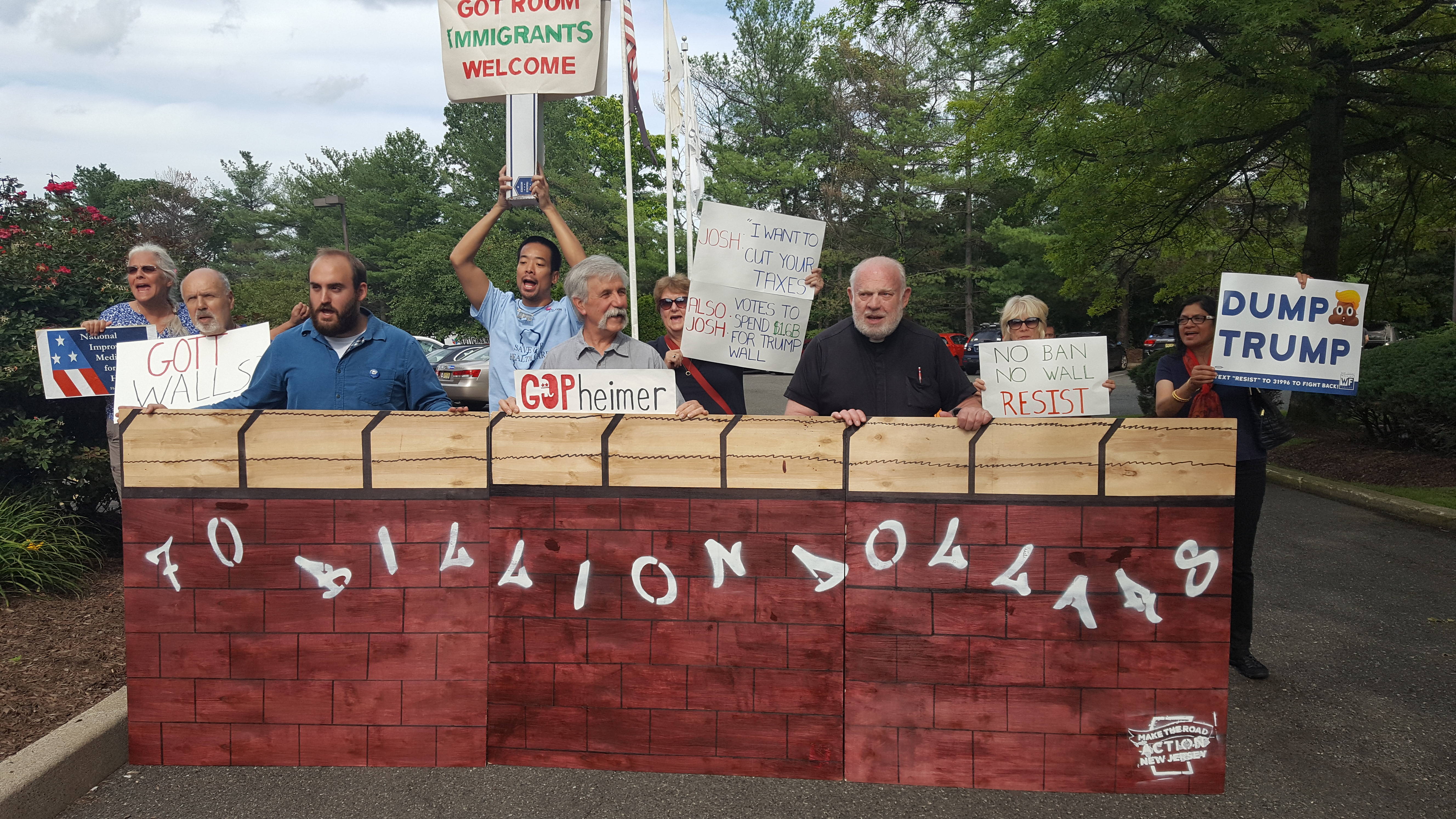 b5217f8aae2e4f7c9e95_gottheimer_trump_protest.jpg