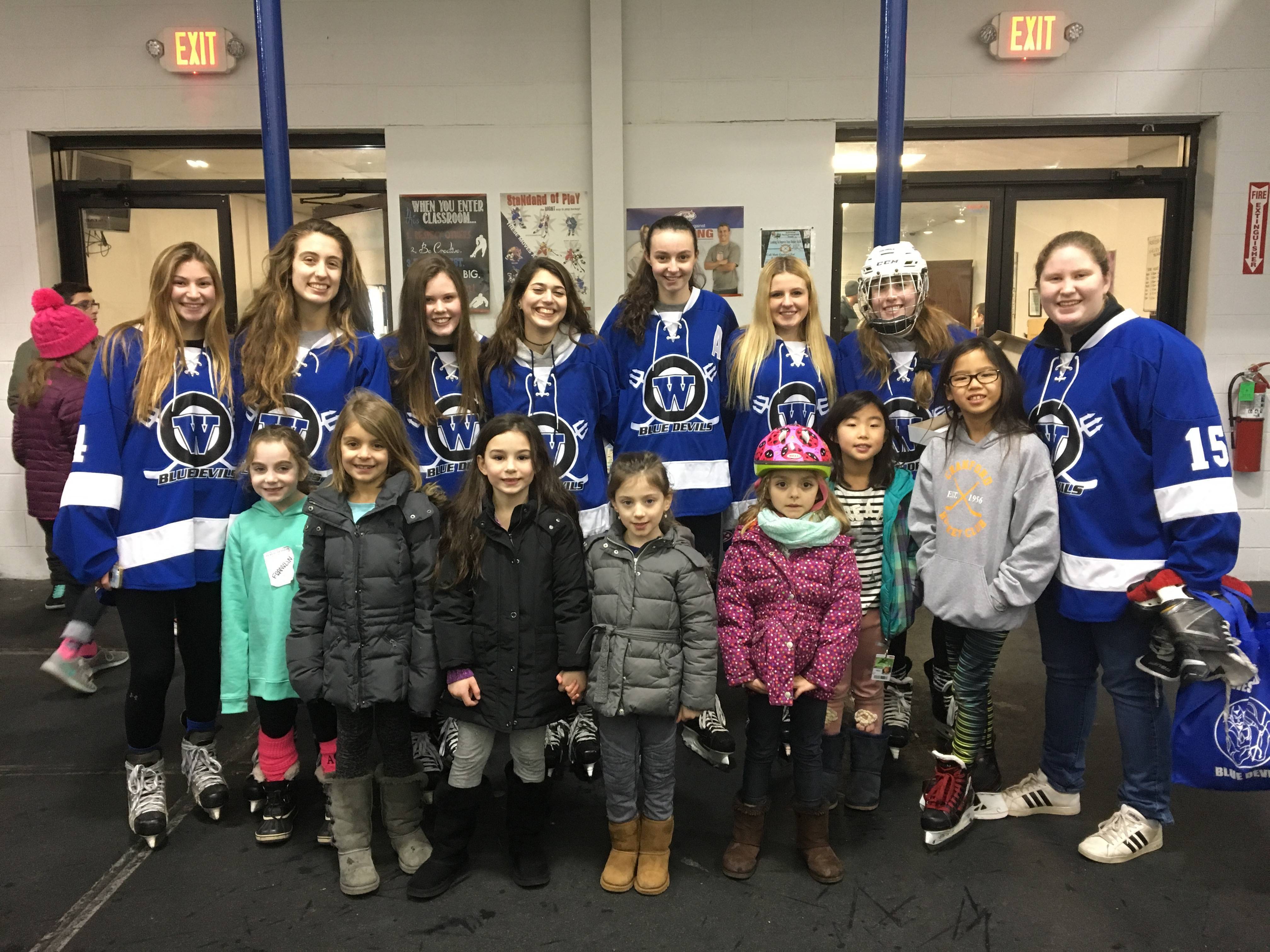 b73ba22fc9fcf6c9261b_402f336b1caa7f5bd8f8_FranklinwithWHSHockeyTeam2017.jpeg