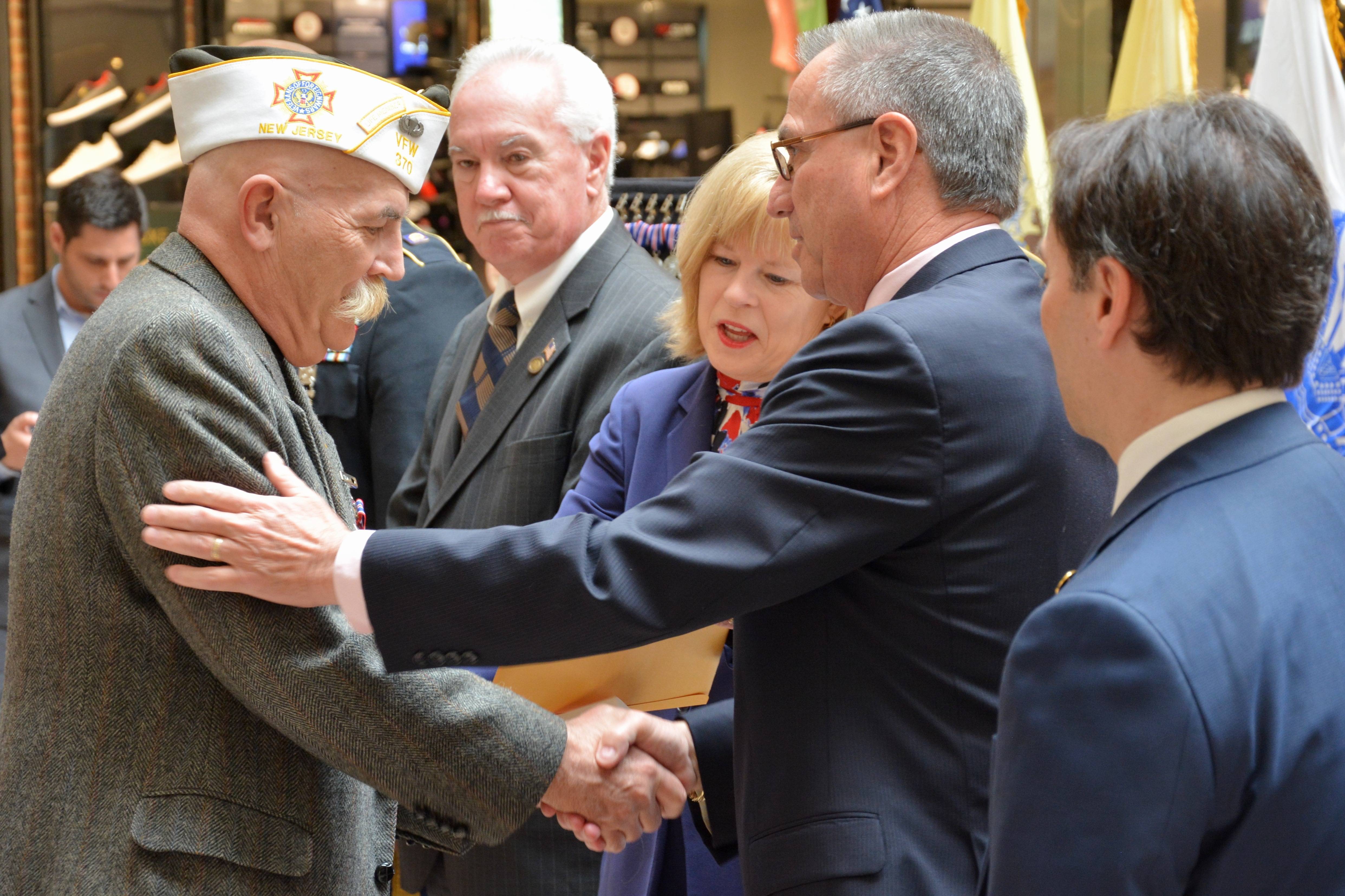 b7b8a0df2493848a798e_Rios_at_NJ_Medal_Ceremony_E.jpg