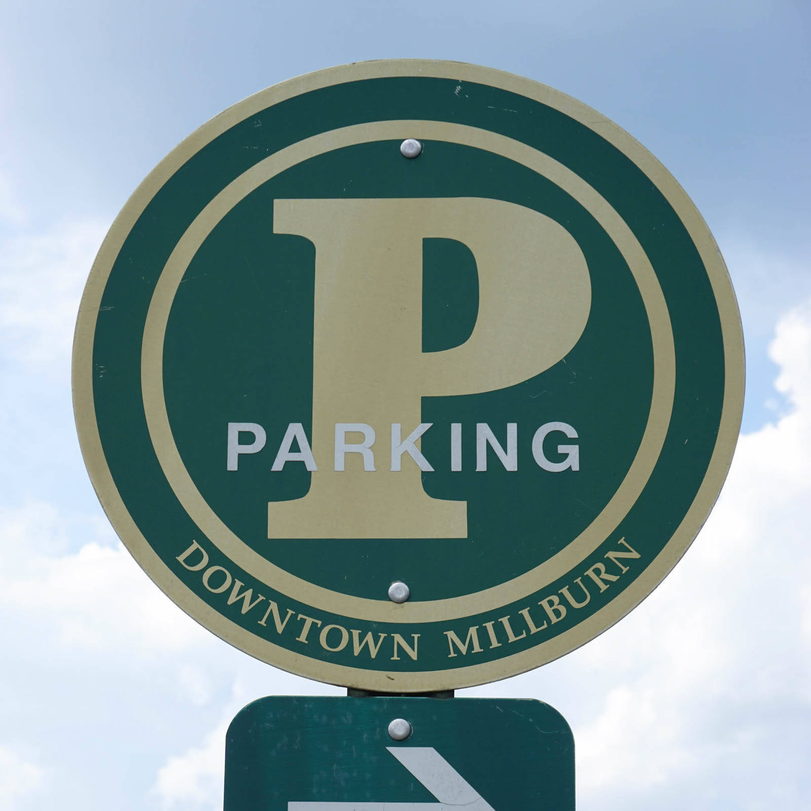 bf3675f58fa30644734d_ec9c78d0fa8836db78ee_parking_sign-1.jpeg