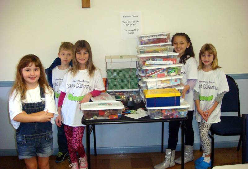 c720c94271fbc5728d6d_e64807dce60669f32aca_group_mini_mission_with_shoeboxes.jpg