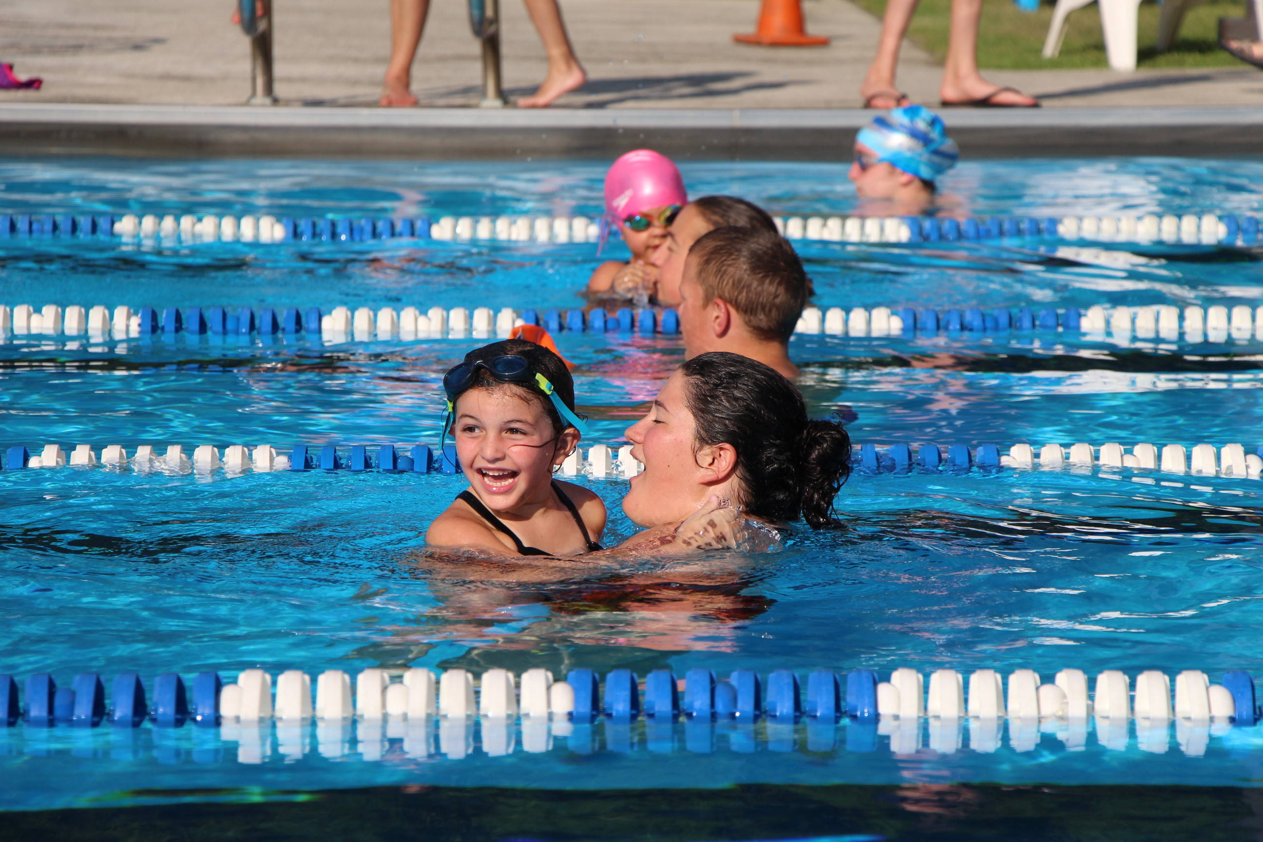 d315ae42b5a040682a13_EDIT_young_female_swimmer_with_catcher.jpg