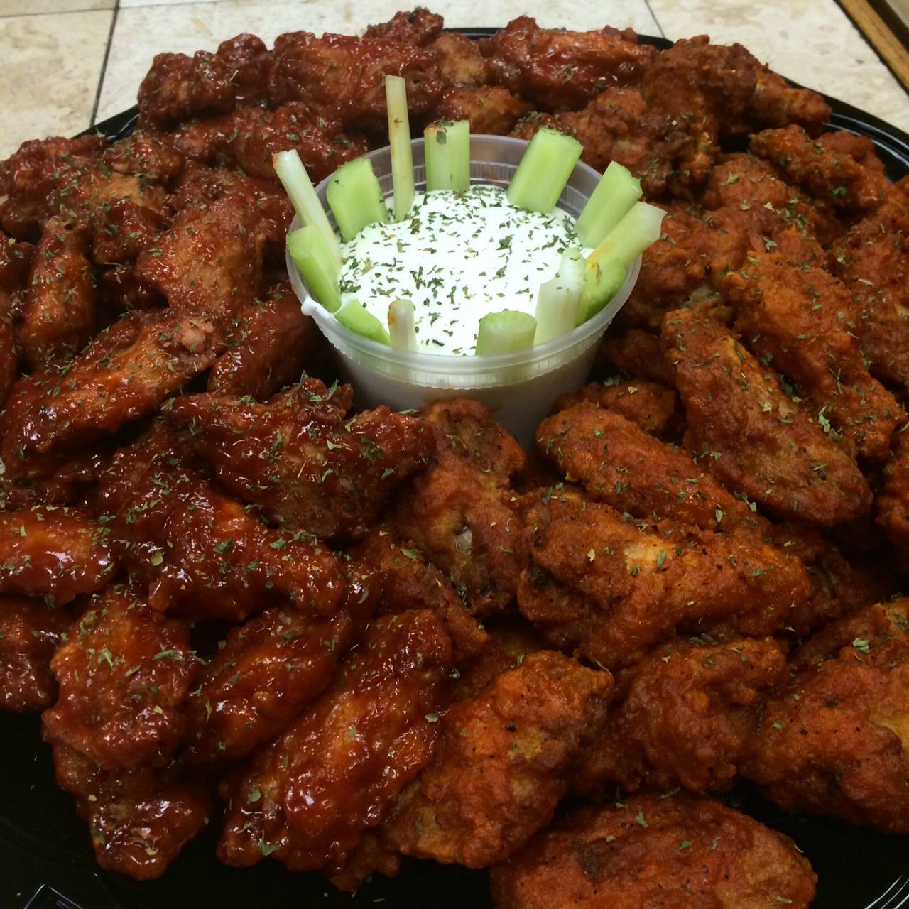 d9a6b58ecbad9b57d3f4_Nick_s_Pizza_wings.jpg