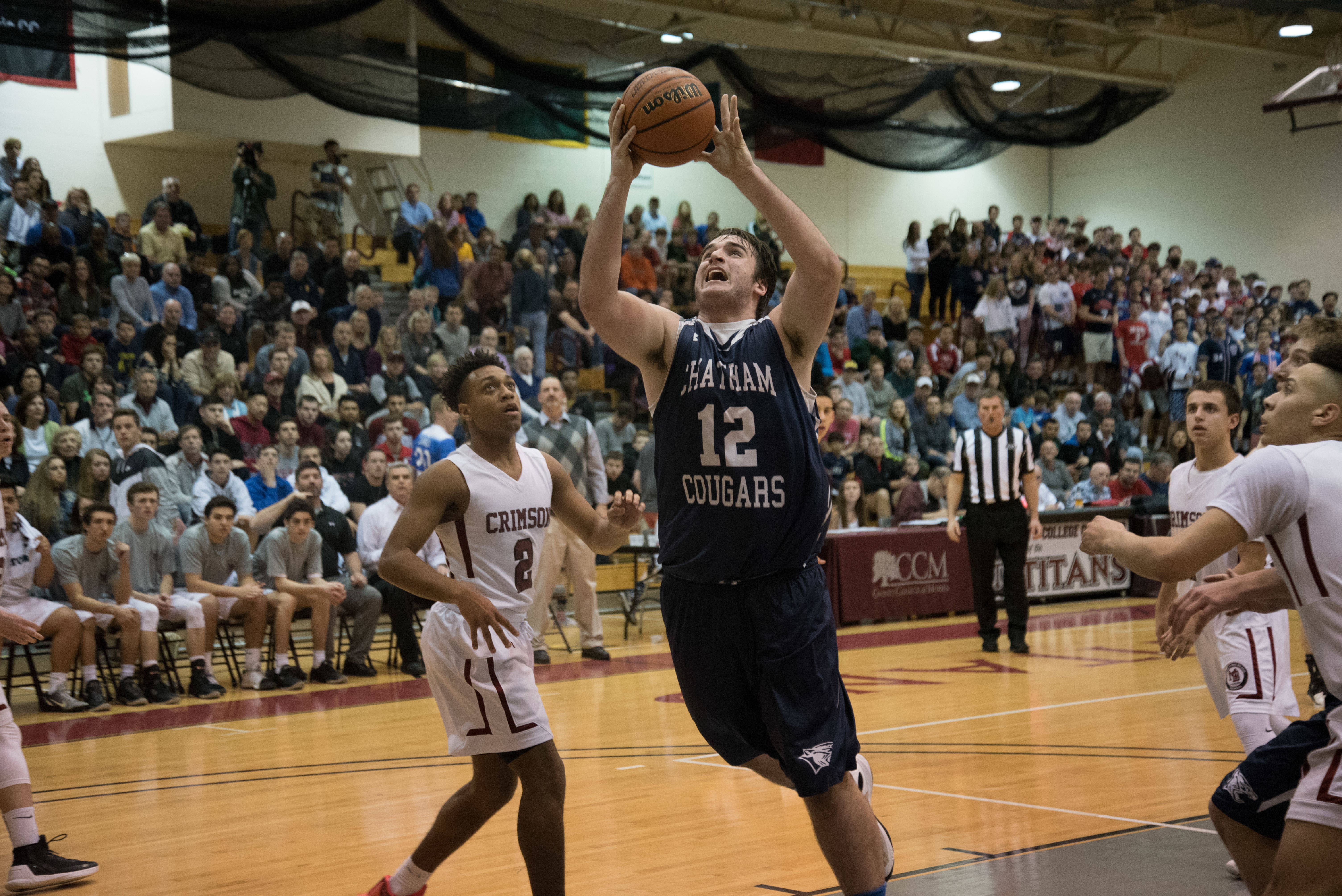 dba5e2f26c0711fab9ae_8f265911ca93c8f81bff_Rindos_BoysBasketball2016_18176.jpg