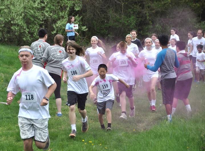 e04f8179564f87f8a6a1_sompixrainbowrun.jpg
