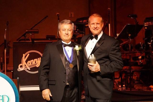 e34522d8454131408de2_fbad454329153f9ec13e_Chairman_Gorman_presenting_FFOY_to_Dr._McCarrick.jpg