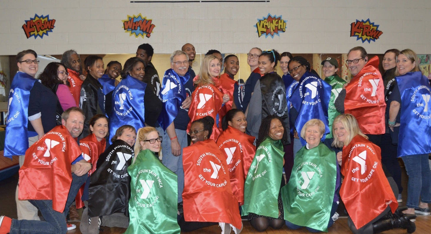 e95d3b17296a47e62a6a_SMY_staff_capes.jpg