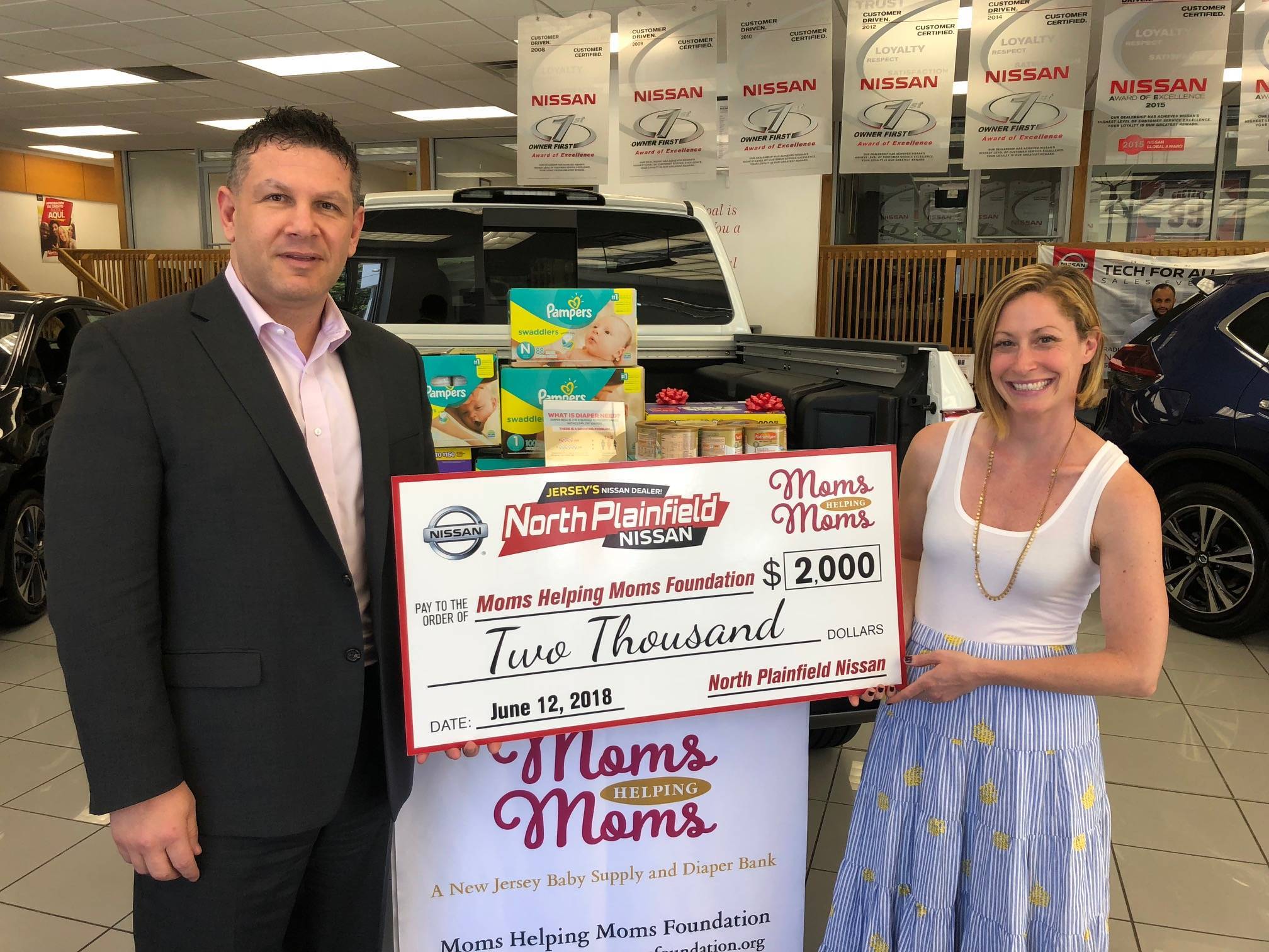 ec6b5acc77f9b0da9ee3_North_Plainfield_Nissan_Check_Presentation.jpg