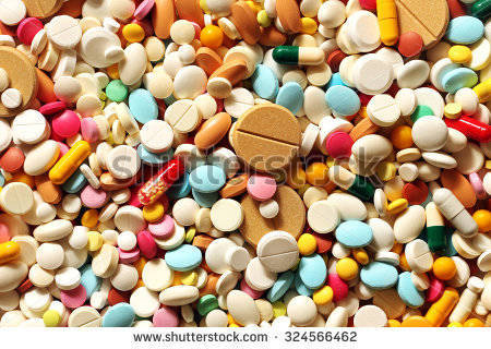 f0accea199e8d0924f59_stock-photo-a-lot-of-colorful-medication-and-pills-from-above-324566462.jpg