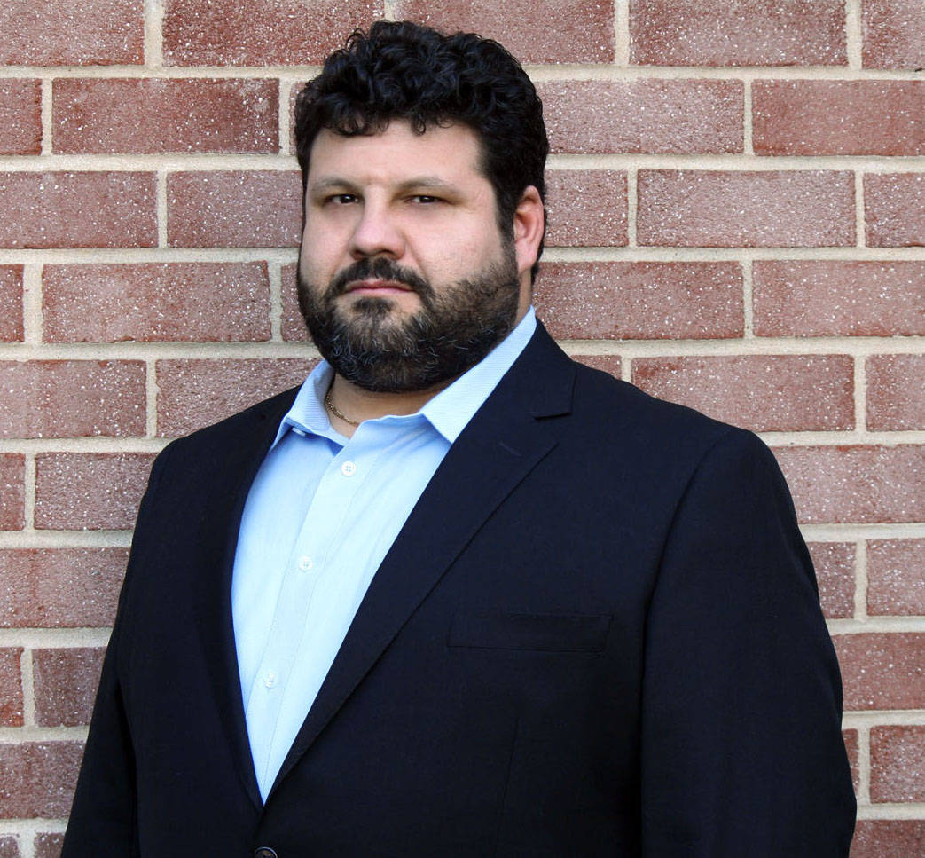 f407468cb51459ea940c_Thomas_Pluck_headshot.jpg