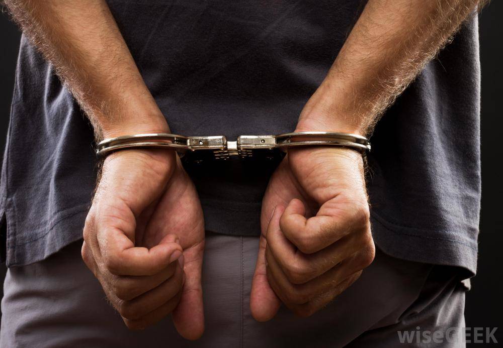 f47c085f918d5f9849cb_arrested-in-handcuffs.jpg
