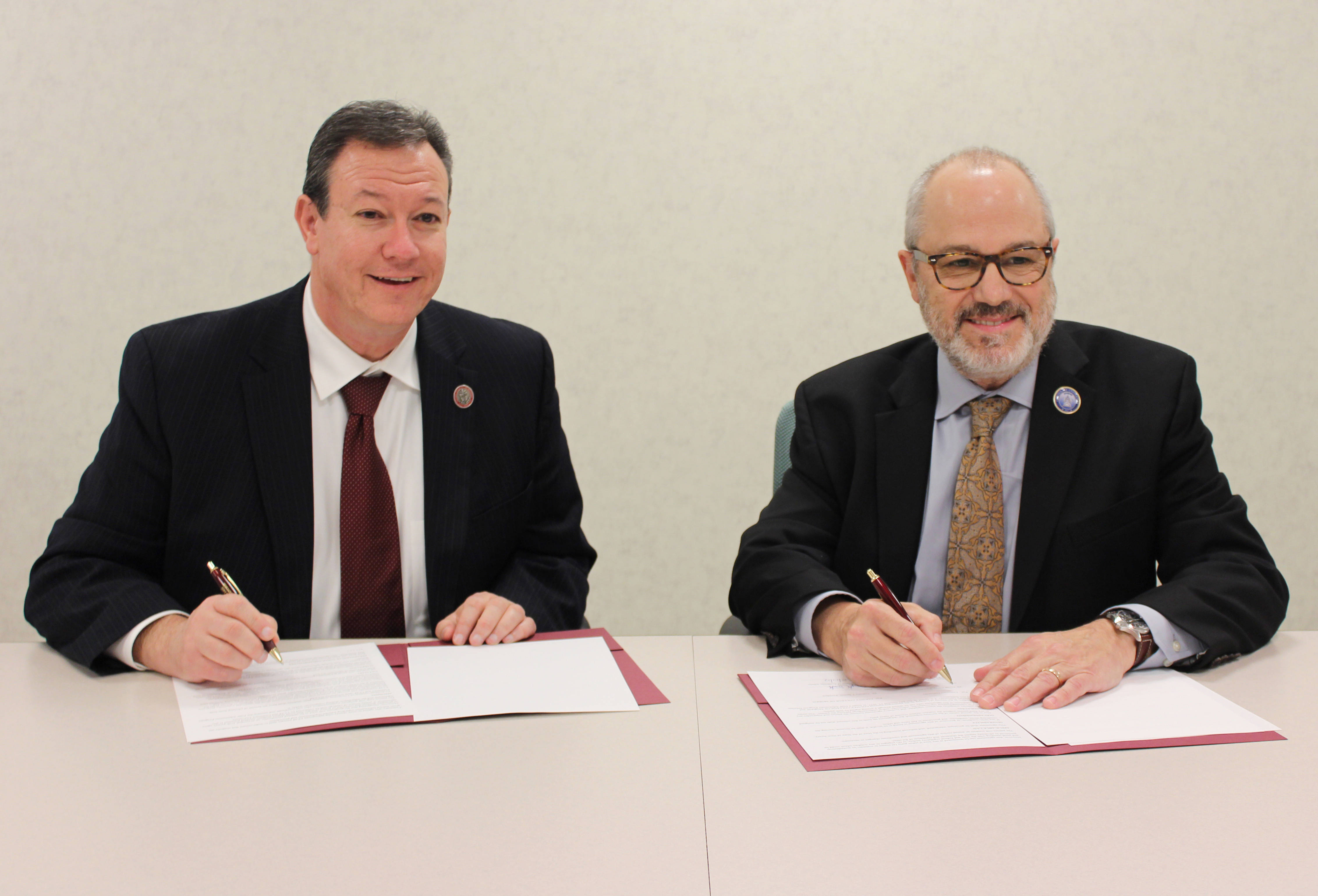 fde41649eab121487d20_CCMCentenarysigning2.jpg