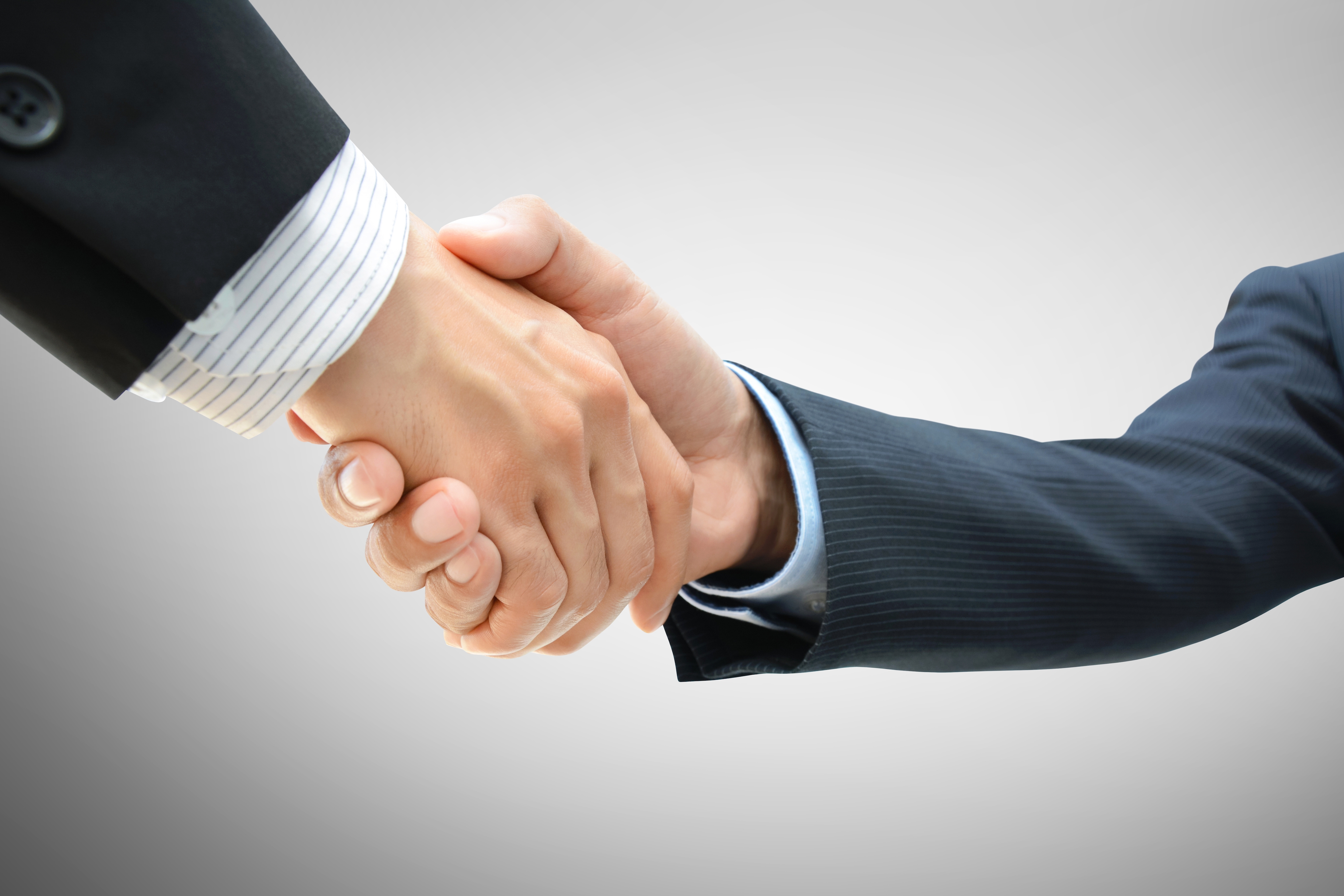 67e63b1a50b546f2ad1a_a7f499fa8af929126229_5f6196dd99eeb4420b8c_Business_Handshake.jpg