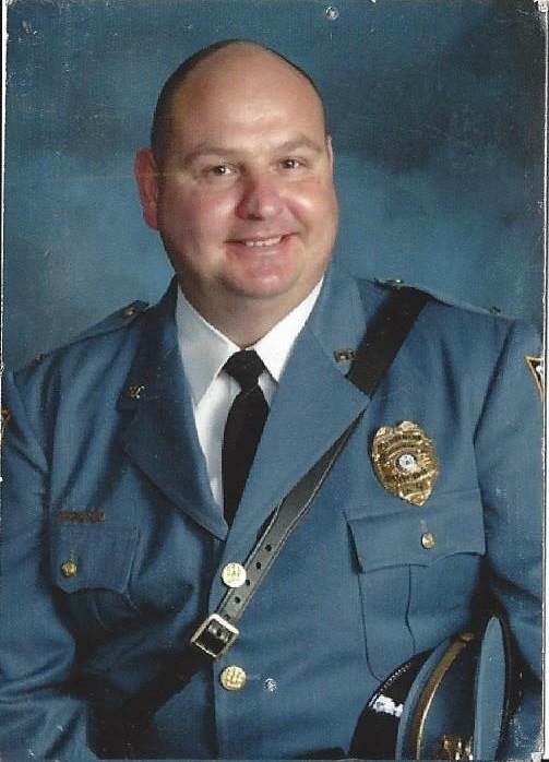 5272f42858c42be50d80_Jeffdressuniformphoto.jpg