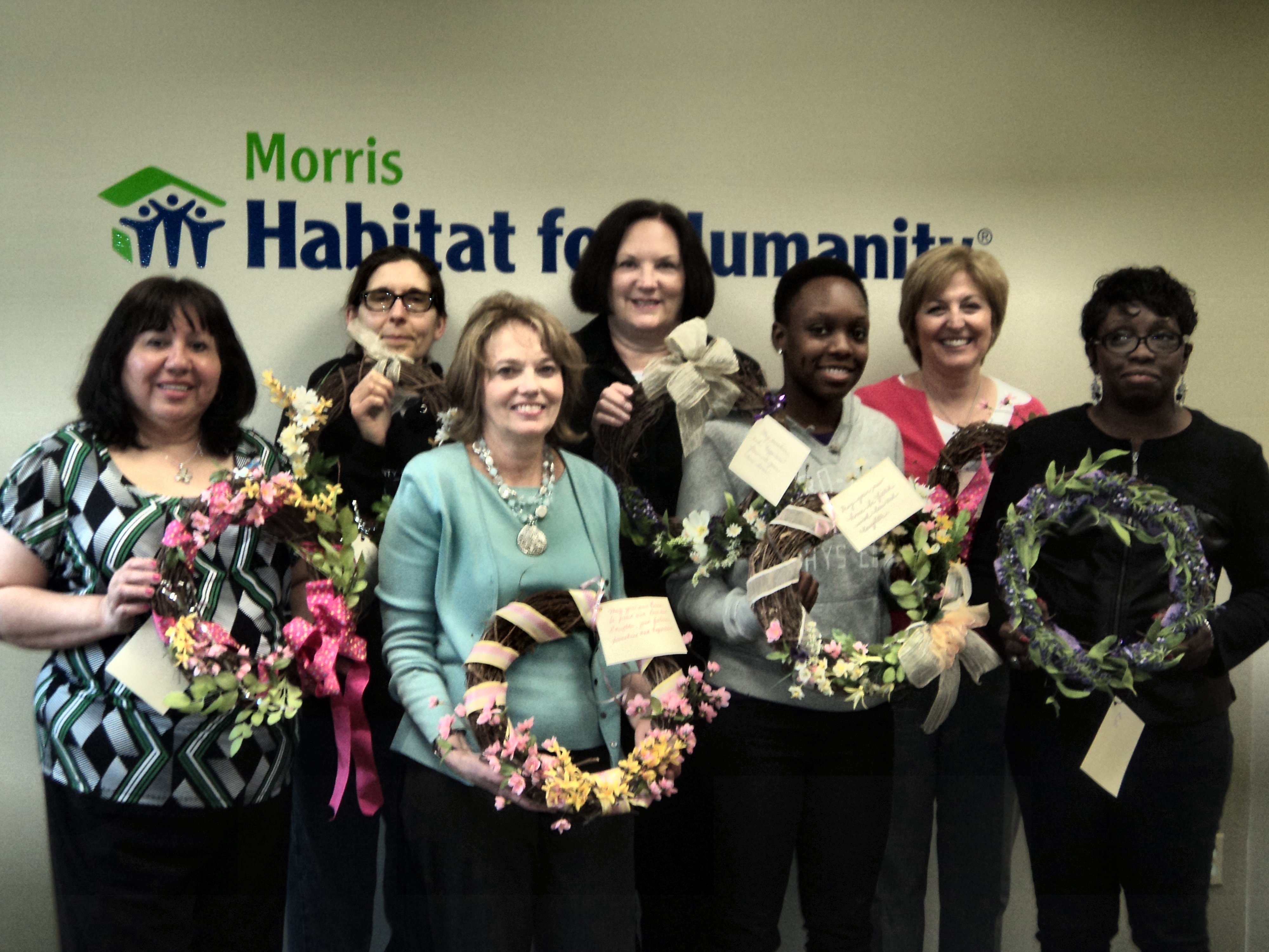 6881df99d9871b6410cb_4-2013_CCM_Staff_Make_Wreaths.jpg