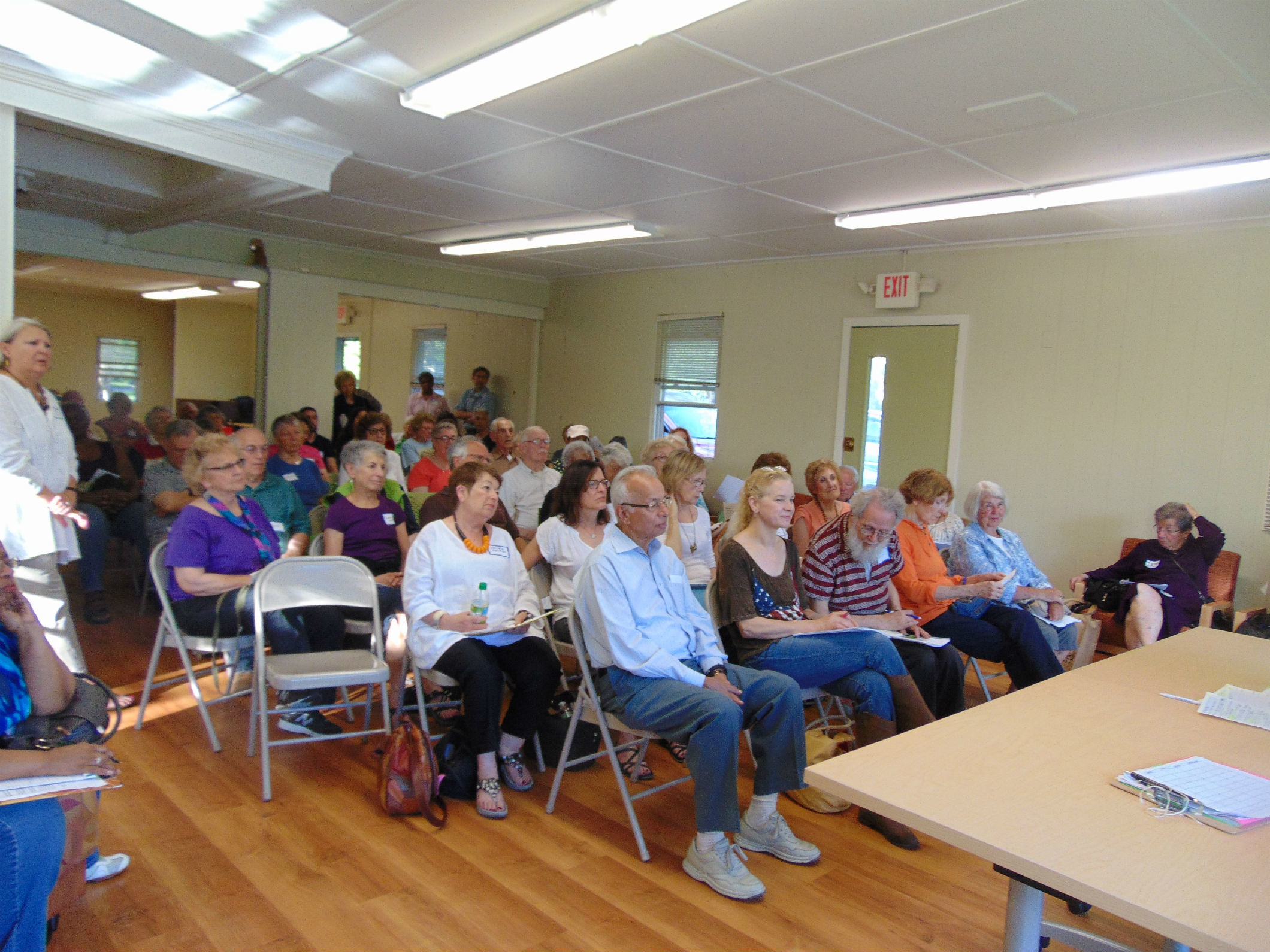 008ca8d2ad5fba3839bd_AIM_1st_meeting.full_house.jpg