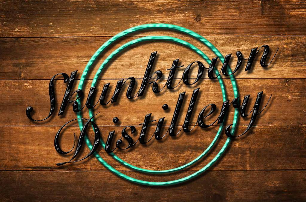 aaf0192fe1a2d8953f06_ed1cd9deae27007901f6_skunktown_logo_sign.jpg
