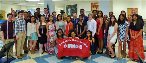 012b3fe8582bc7f7069f_Tri-M_Honor_Society_seniors_receive_cords_for_graduation..jpg