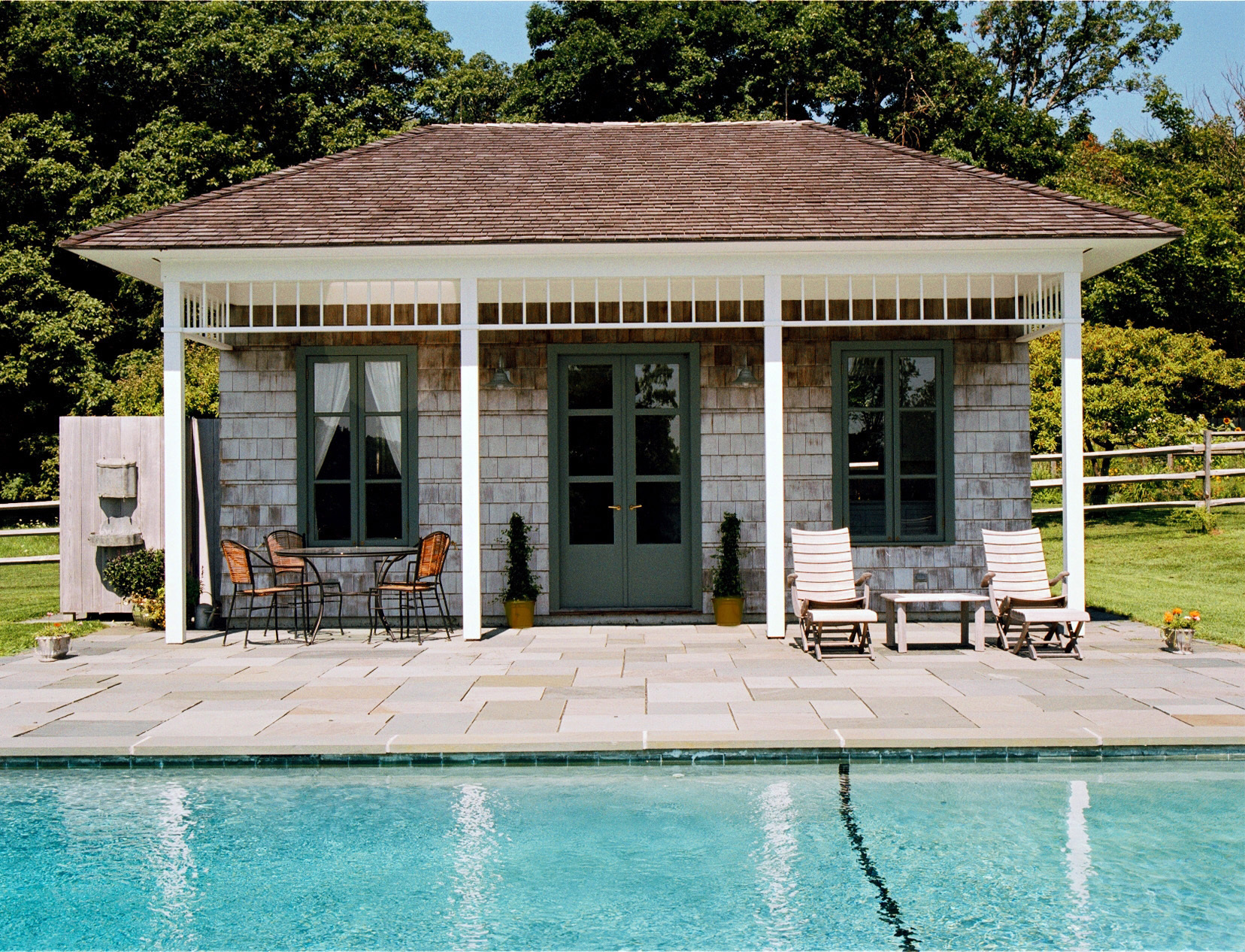 3ba693cdb2f1e603d451_berry_20pool_20house_20-_20exterior-_20head_20on-_20green_20flower_20pots.jpg