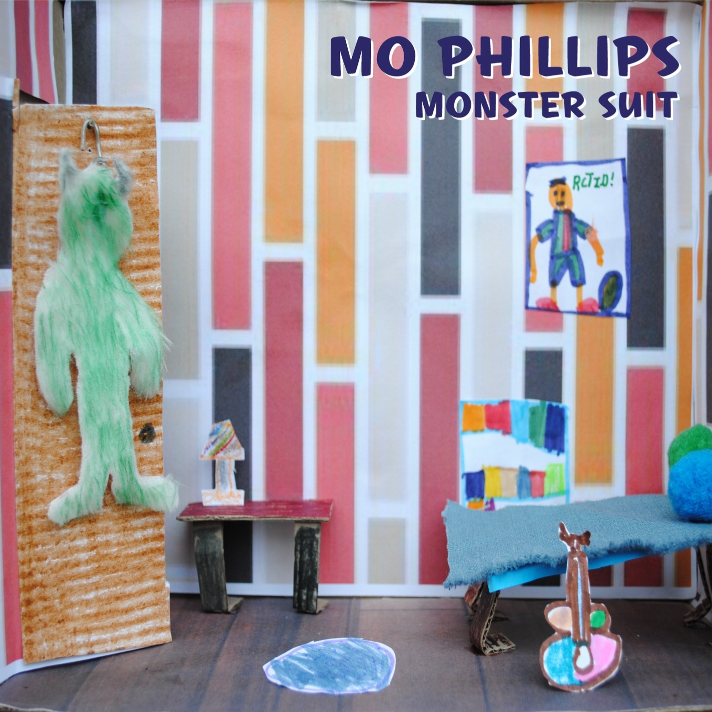 423323a419fc278b25fa_mo_phillips_monster_suit_cover_art_300_dpi.jpg