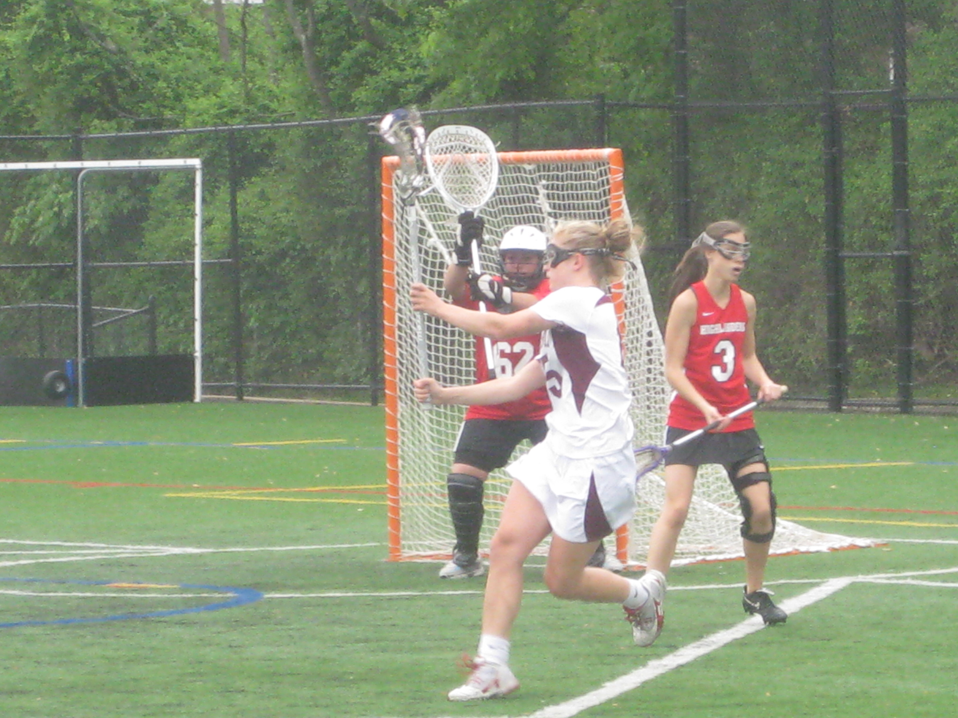 67dd1535a89ee9ba51d5_summit_girls_lax_002.jpg